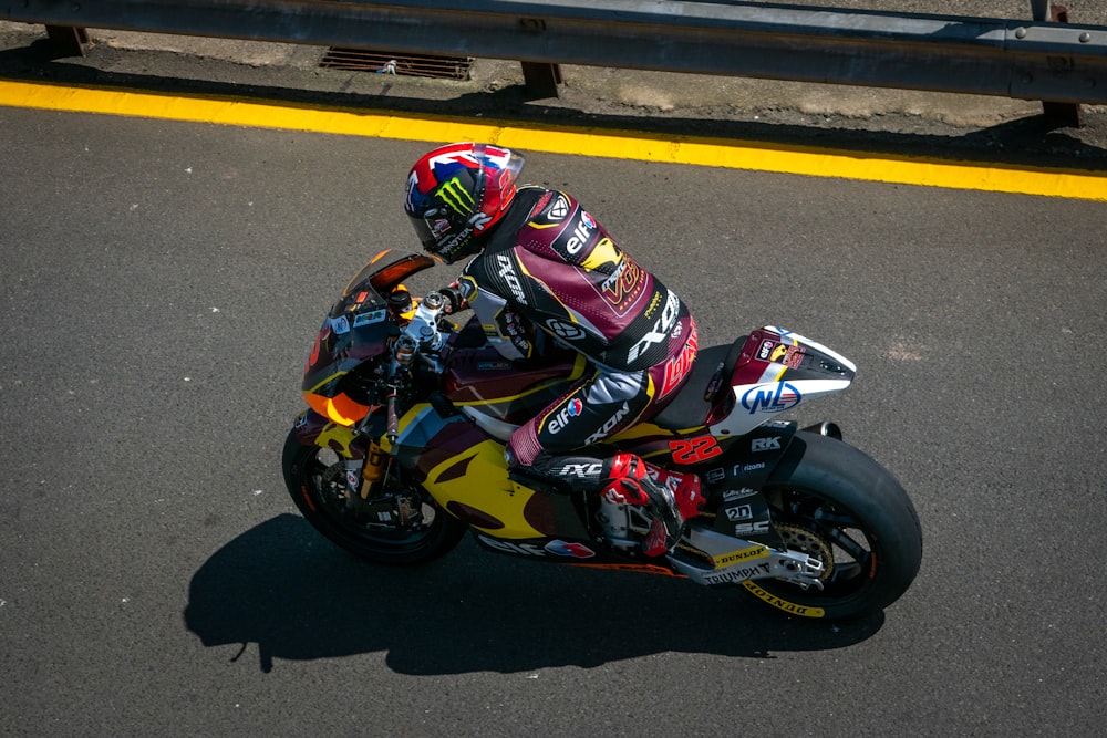 a person riding a motorcycle on a race track