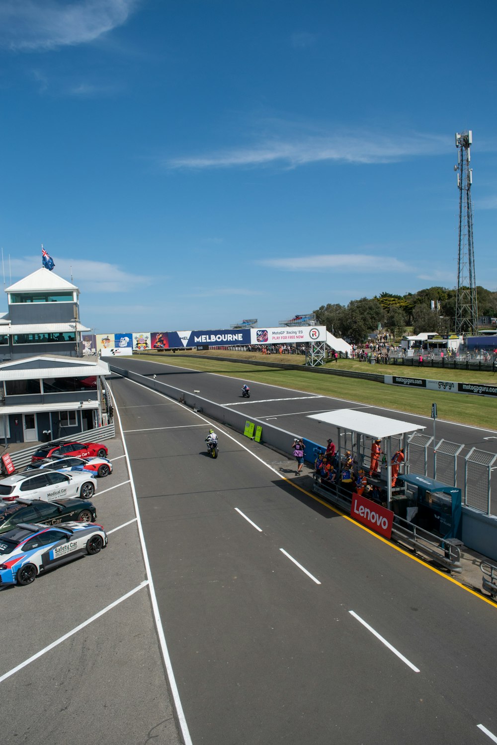 a race track with cars parked on the side of it