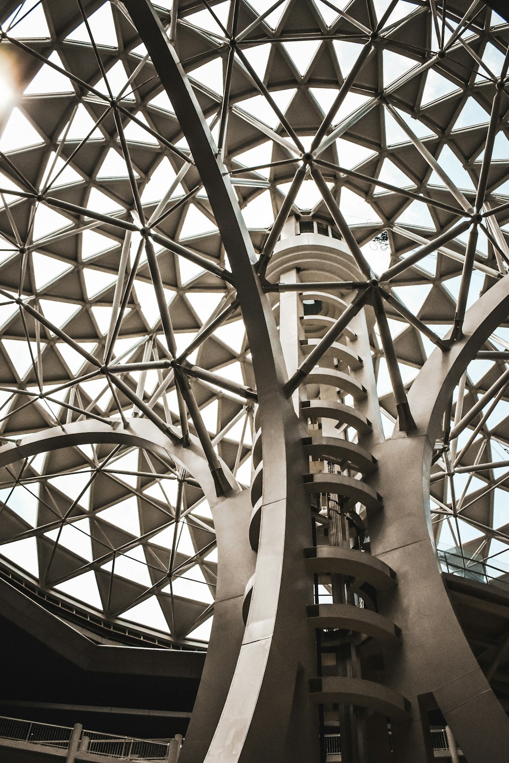 a large metal structure with a skylight in the background