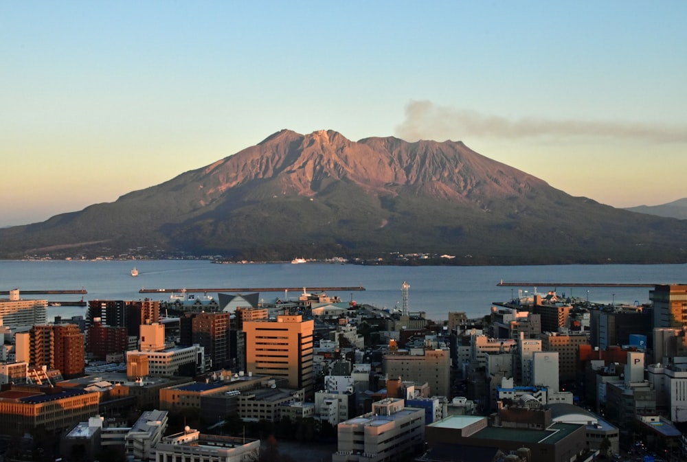 a view of a city with a mountain in the background