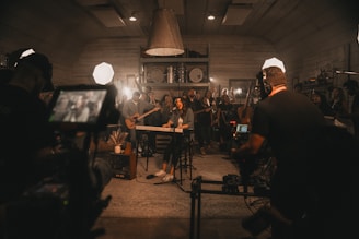 a group of people standing around a room