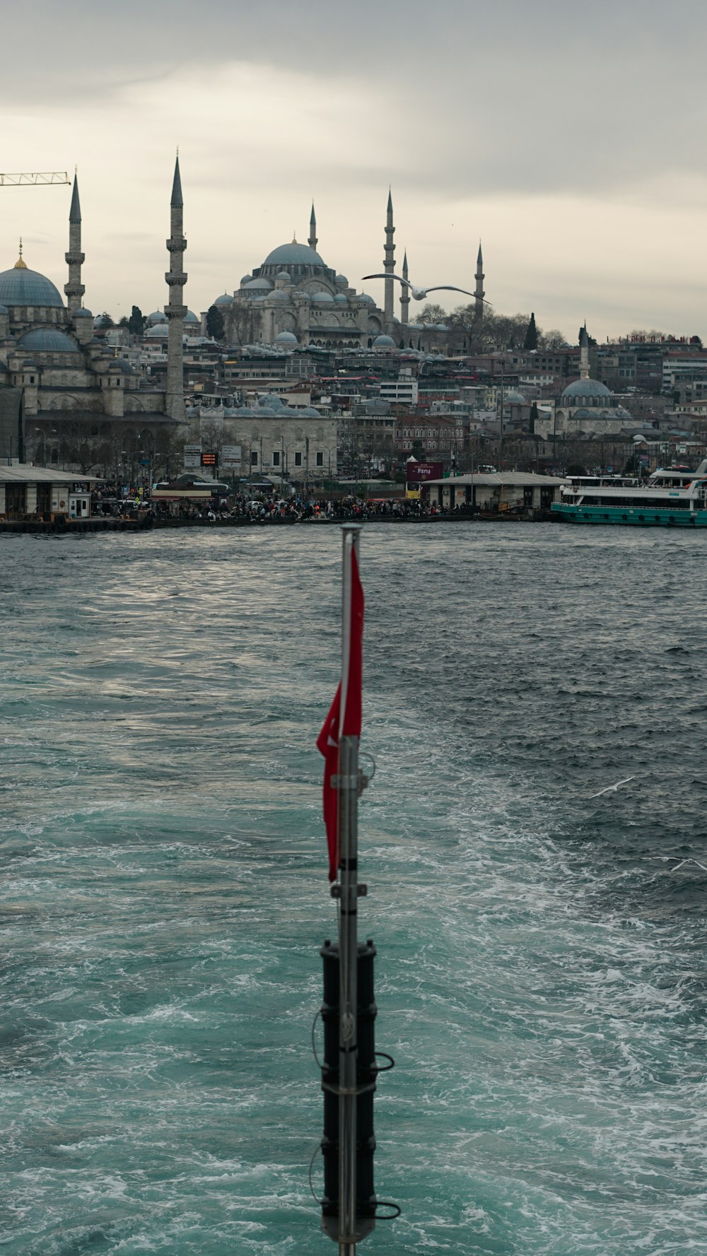 a view of a body of water with a city in the background