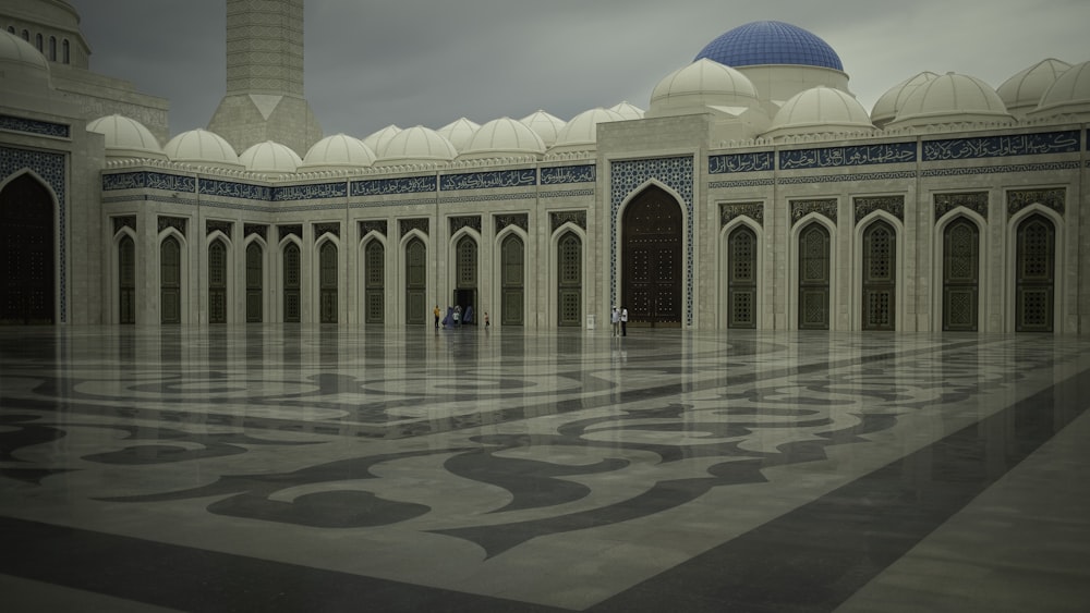 a large building with a blue dome on top of it