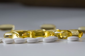 a close up of many pills on a table