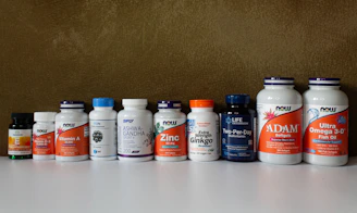 a row of bottles of different types of vitamins
