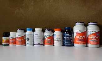 a row of bottles of different types of vitamins