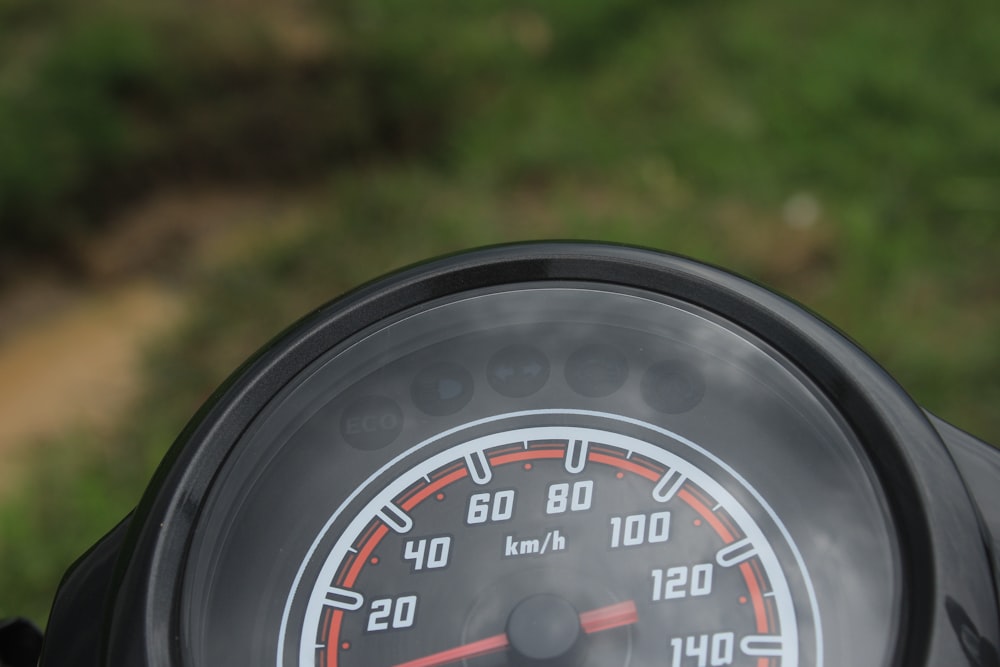 a close up of a speedometer on a motorcycle