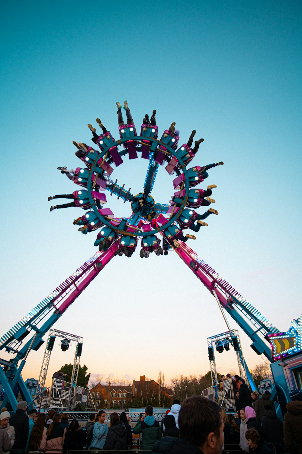 a carnival ride at a fair with a sky background