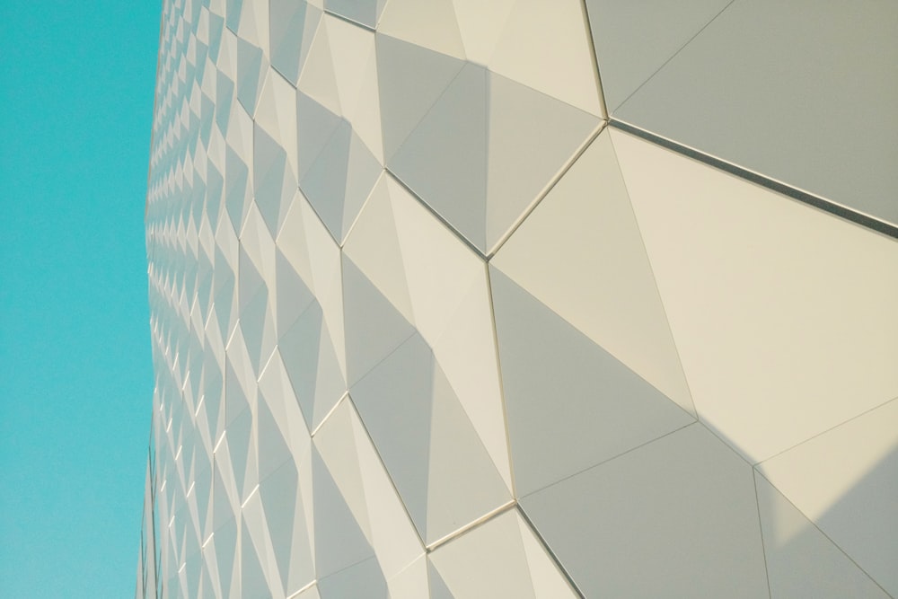 a close up of a building with a blue sky in the background