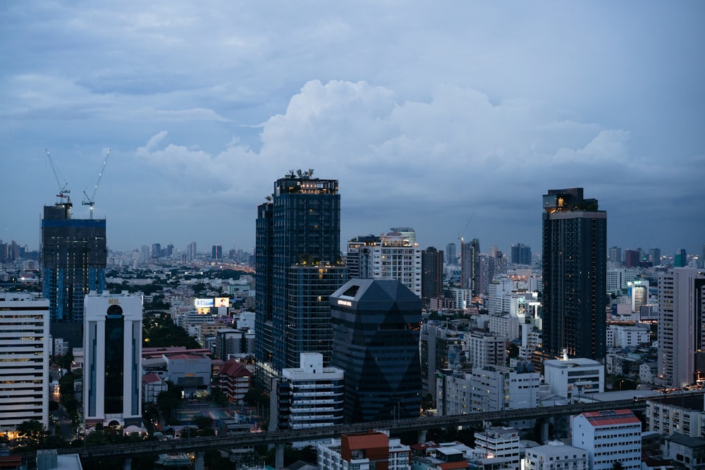 a view of a city at night from the top of a building