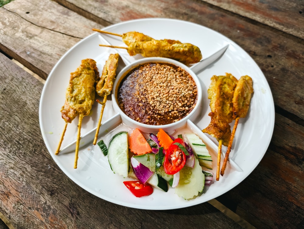 a white plate topped with different types of food