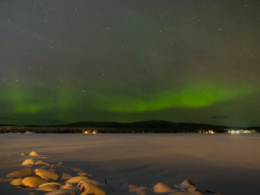 The aurora over a frozen lake — Inari, Finland