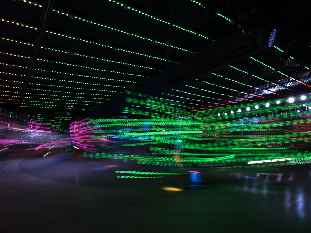 a colorful display of lights inside of a building