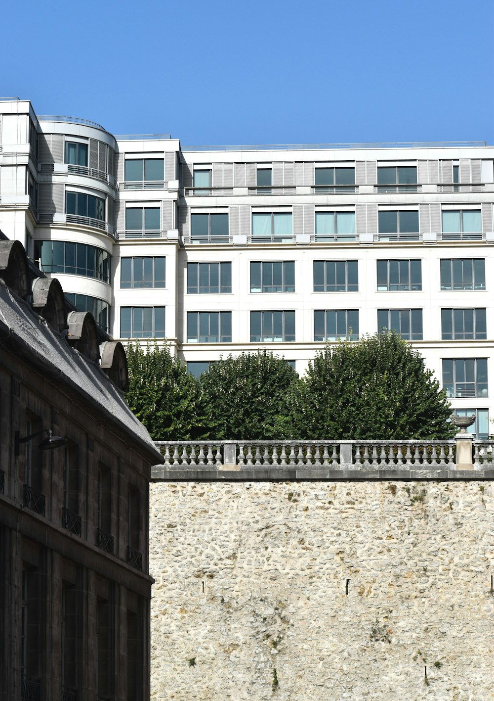 a tall building with a clock on the side of it