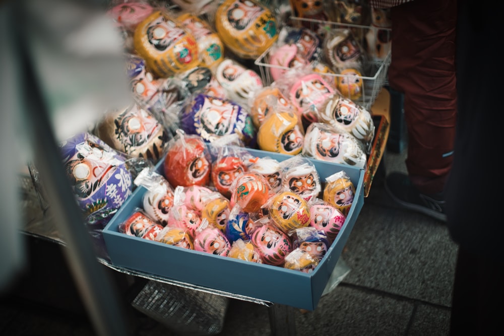 a bunch of skulls that are in a box