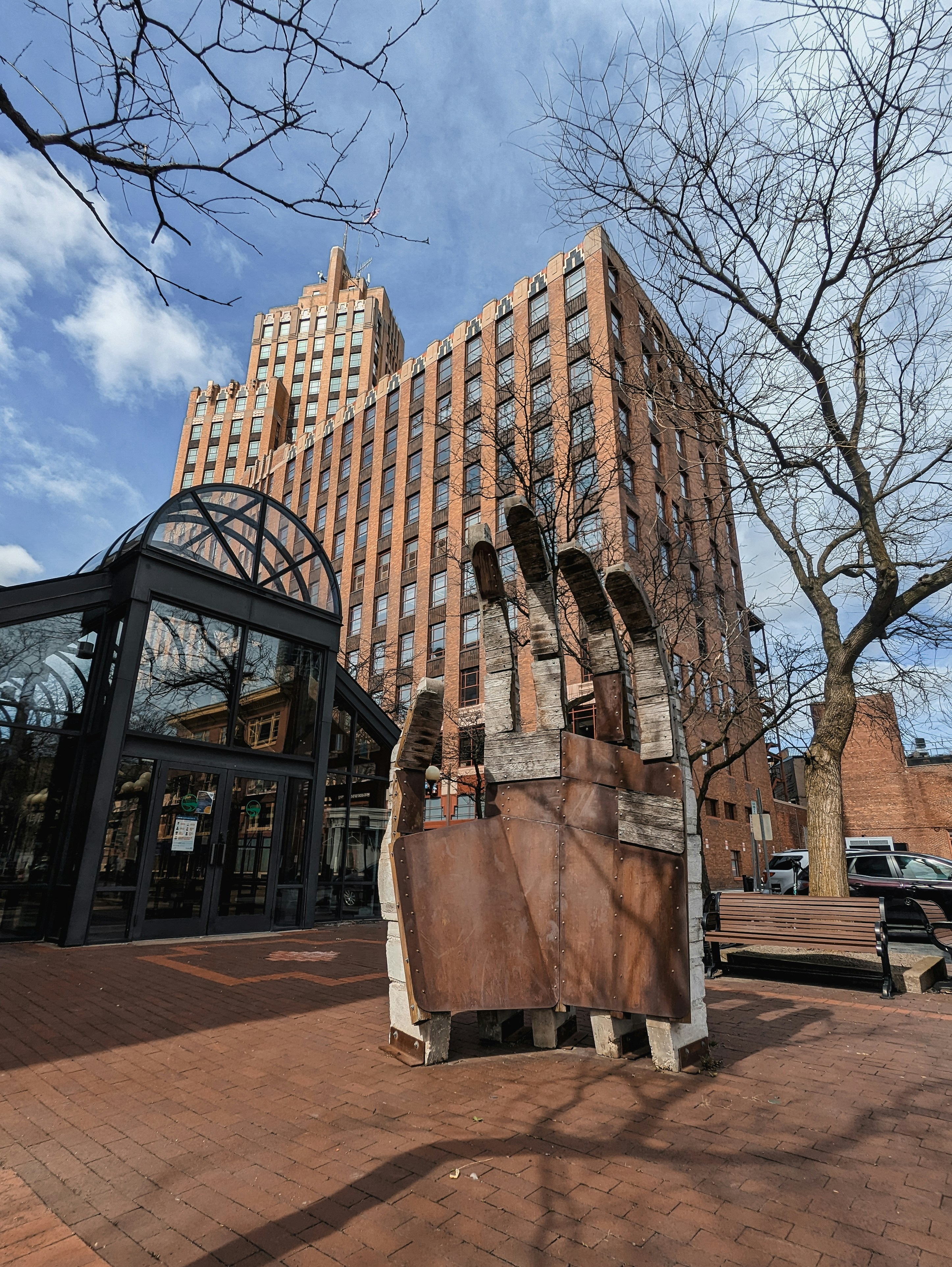 a large building with a statue in front of it