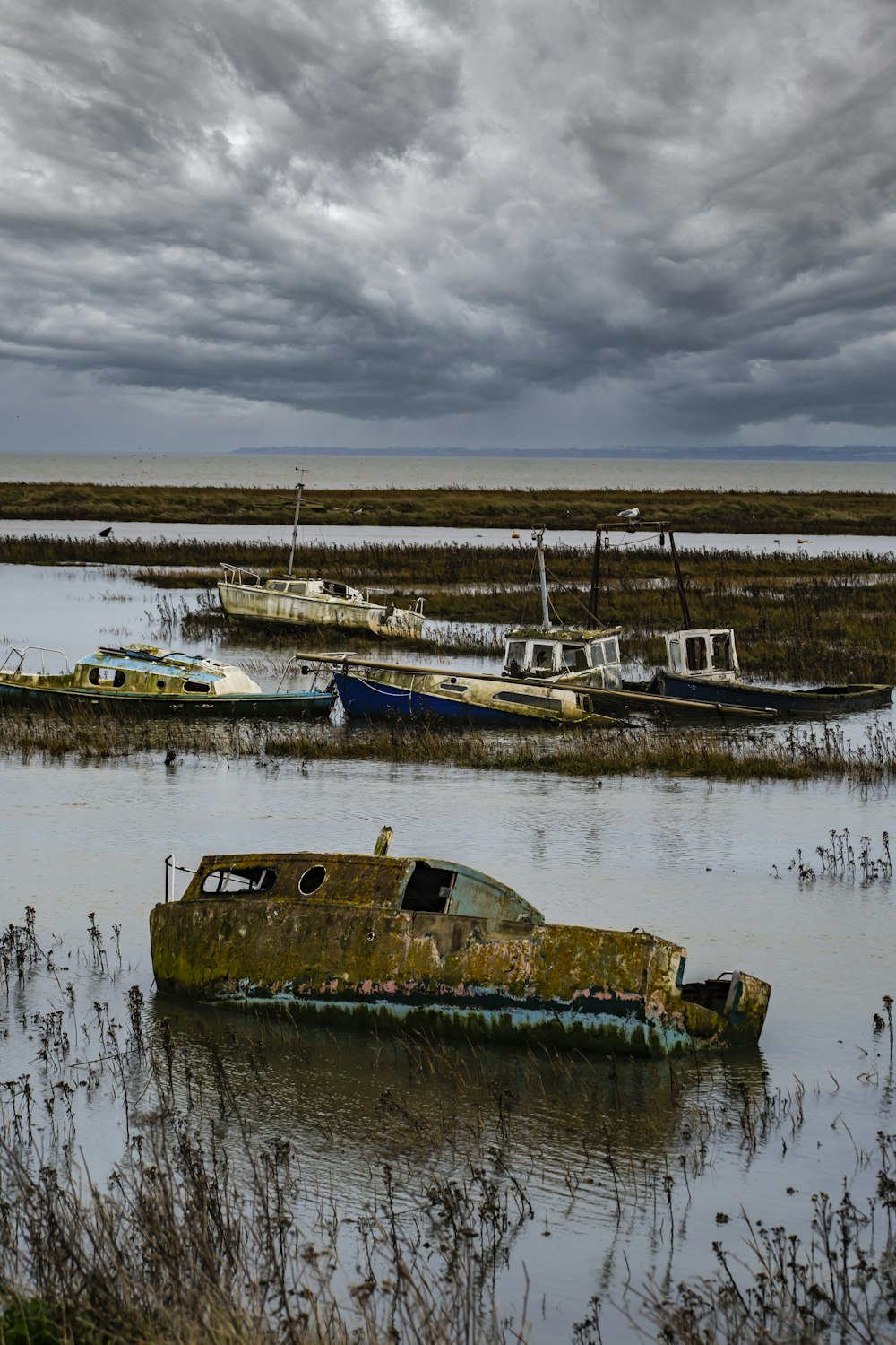 a bunch of boats that are sitting in the water