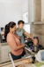 a woman and a child cooking in a kitchen