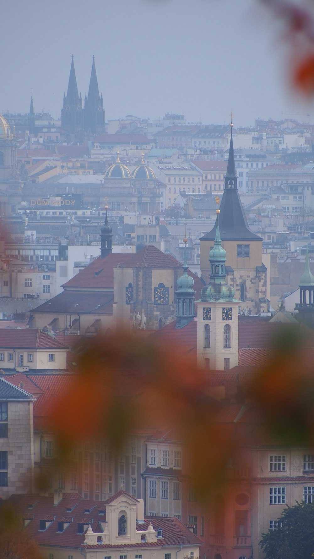 a view of a city with a clock tower