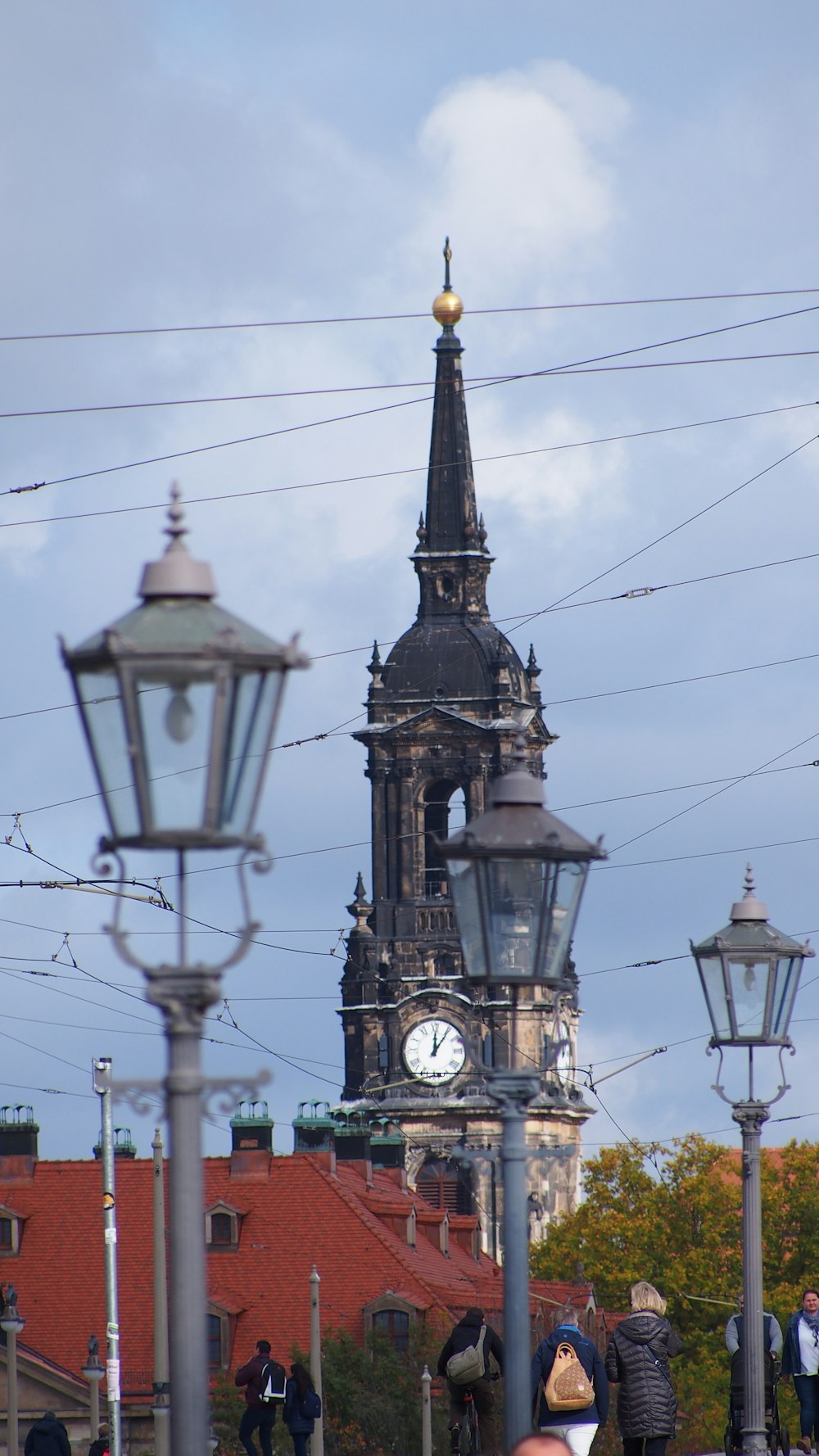 a tall clock tower towering over a city