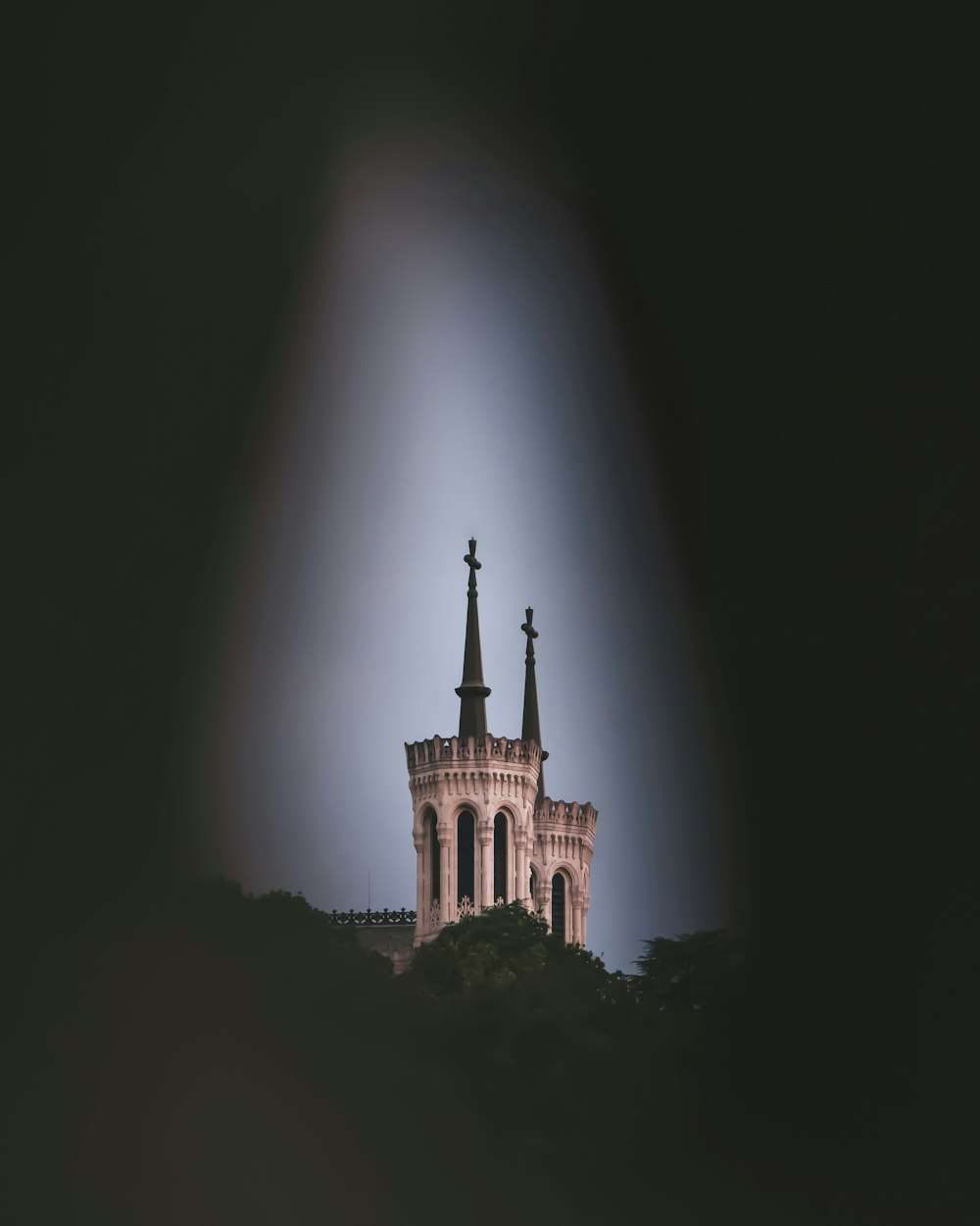 a tall tower with a clock on top of it