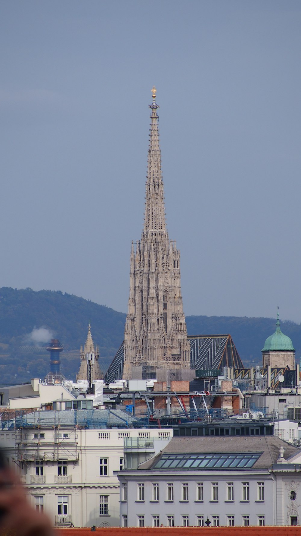 a tall building with a spire on top of it