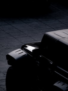 a black and white photo of a truck