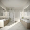 a large bathroom with marble counter tops and sinks