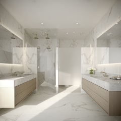 a large bathroom with marble counter tops and sinks