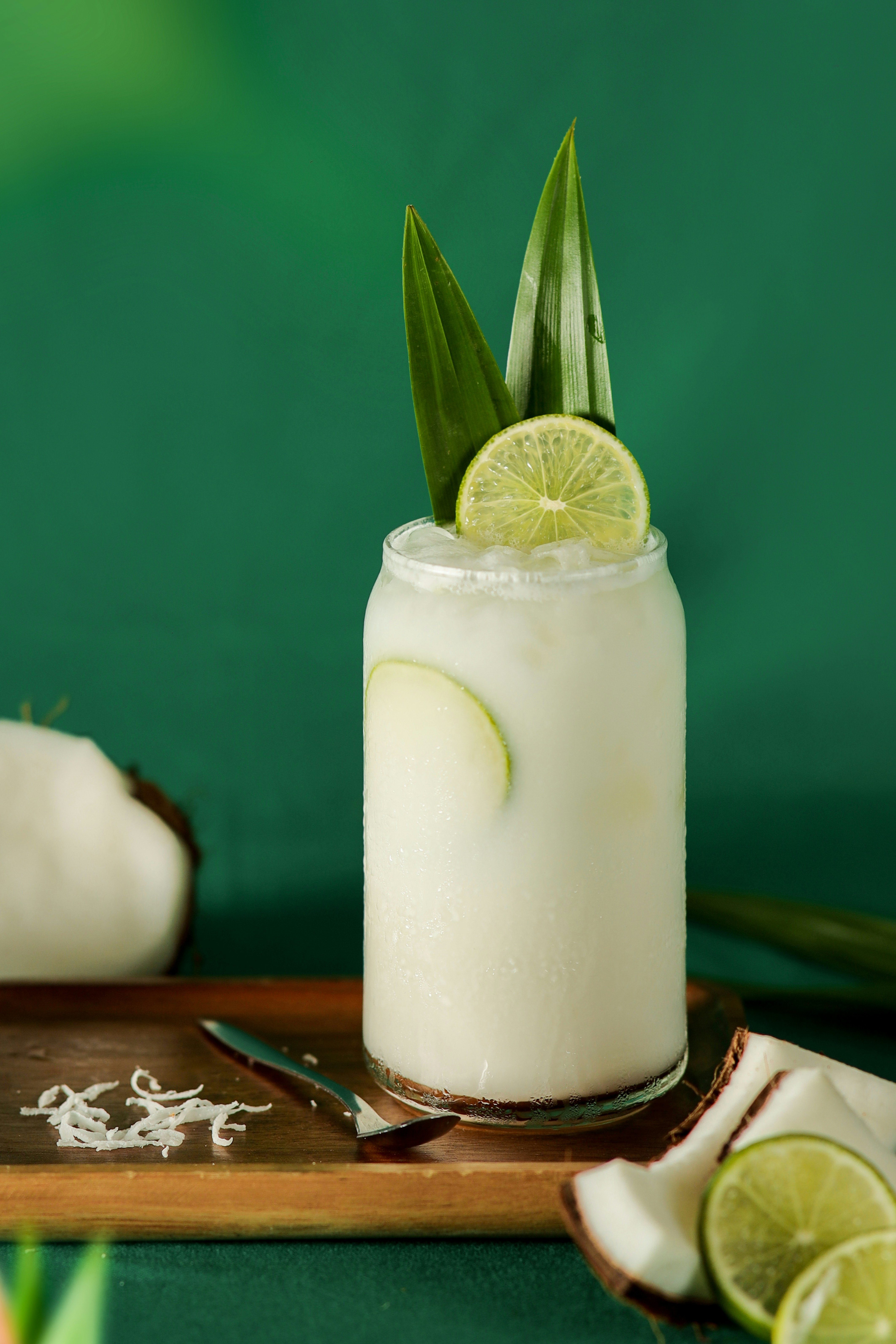 a drink with a slice of lime on top of it