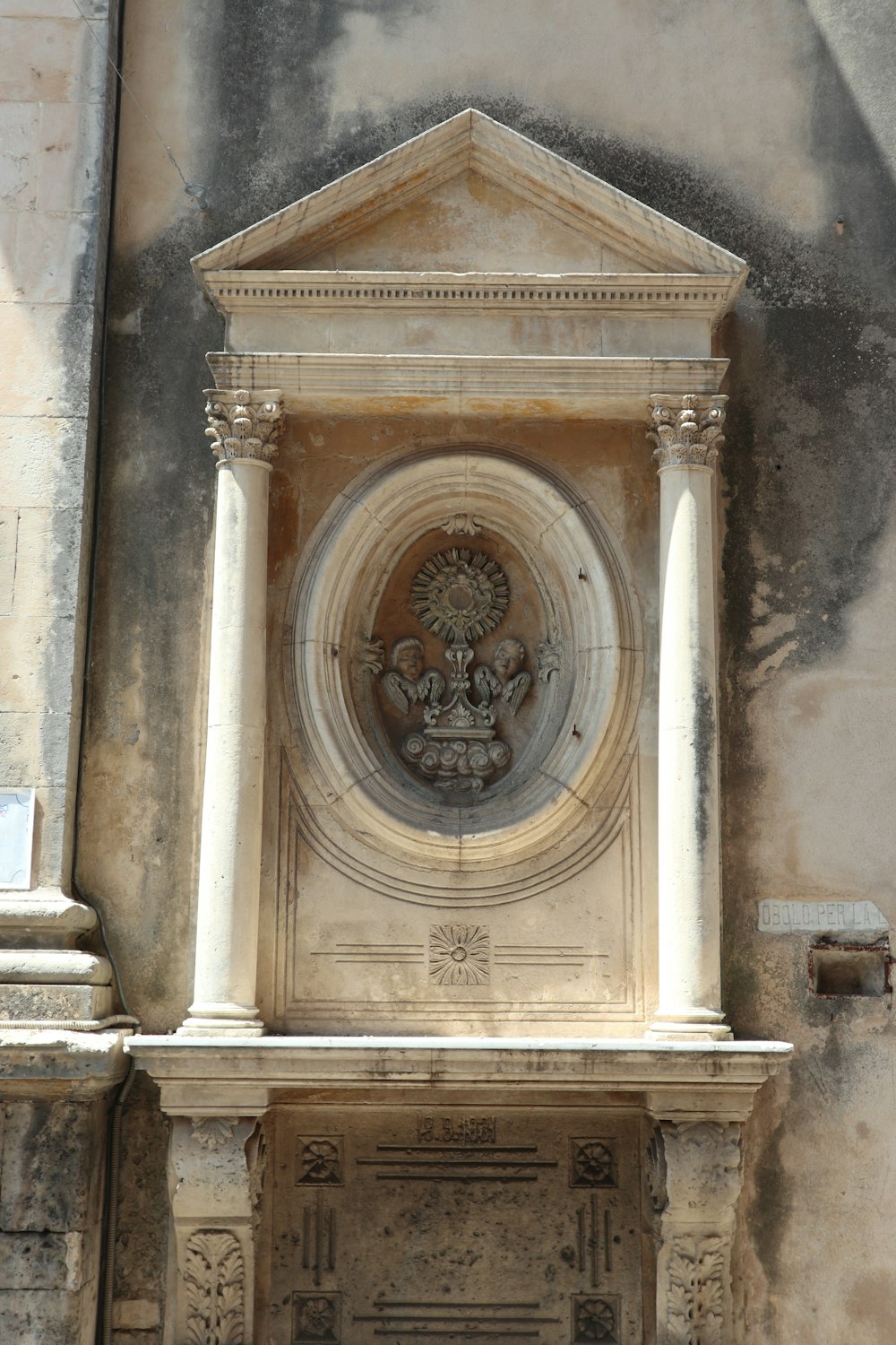 a clock on the side of a building