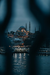 a view of a city at night from across the water