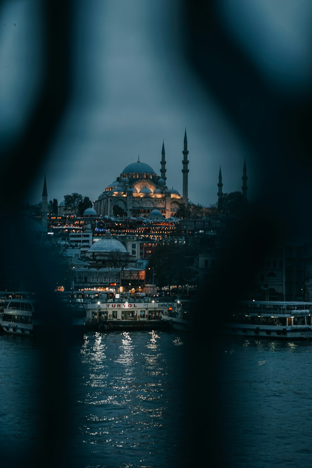 a view of a city at night from across the water