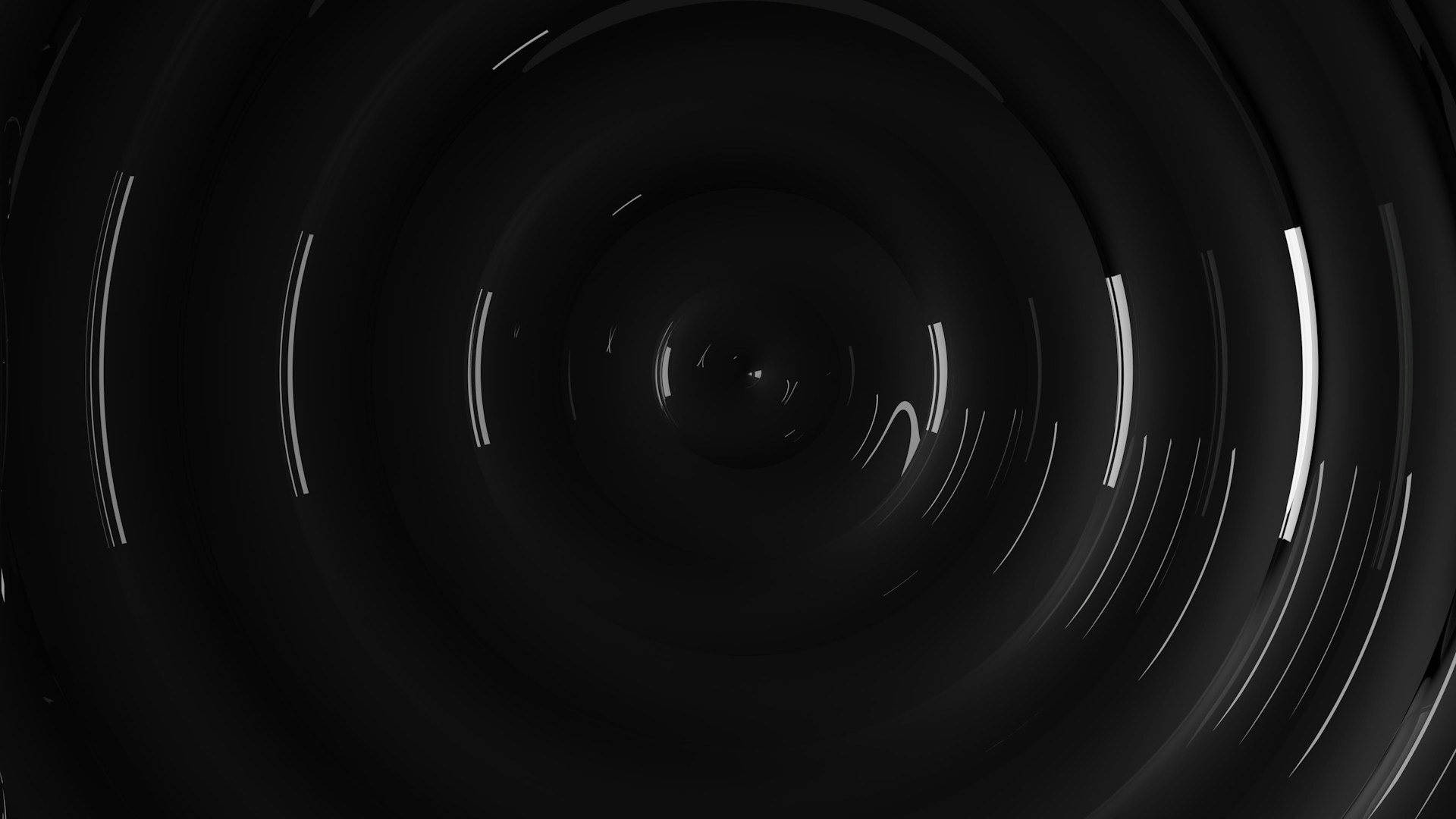 a black and white photo of a circular object