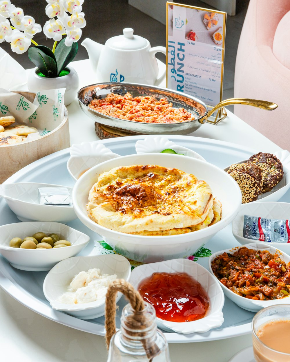 a table topped with lots of different types of food