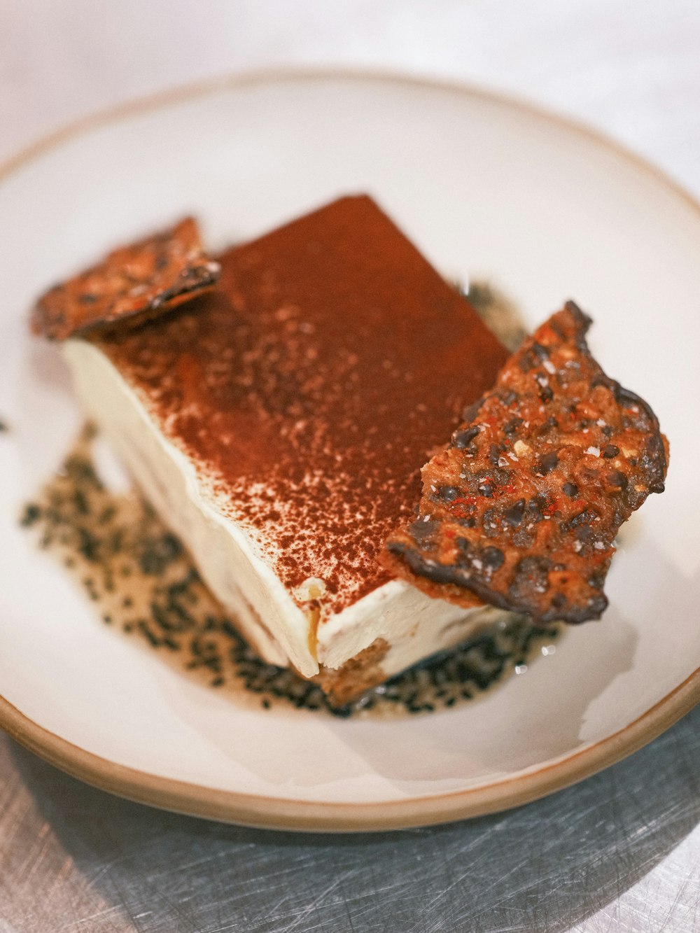 a piece of cake sitting on top of a white plate