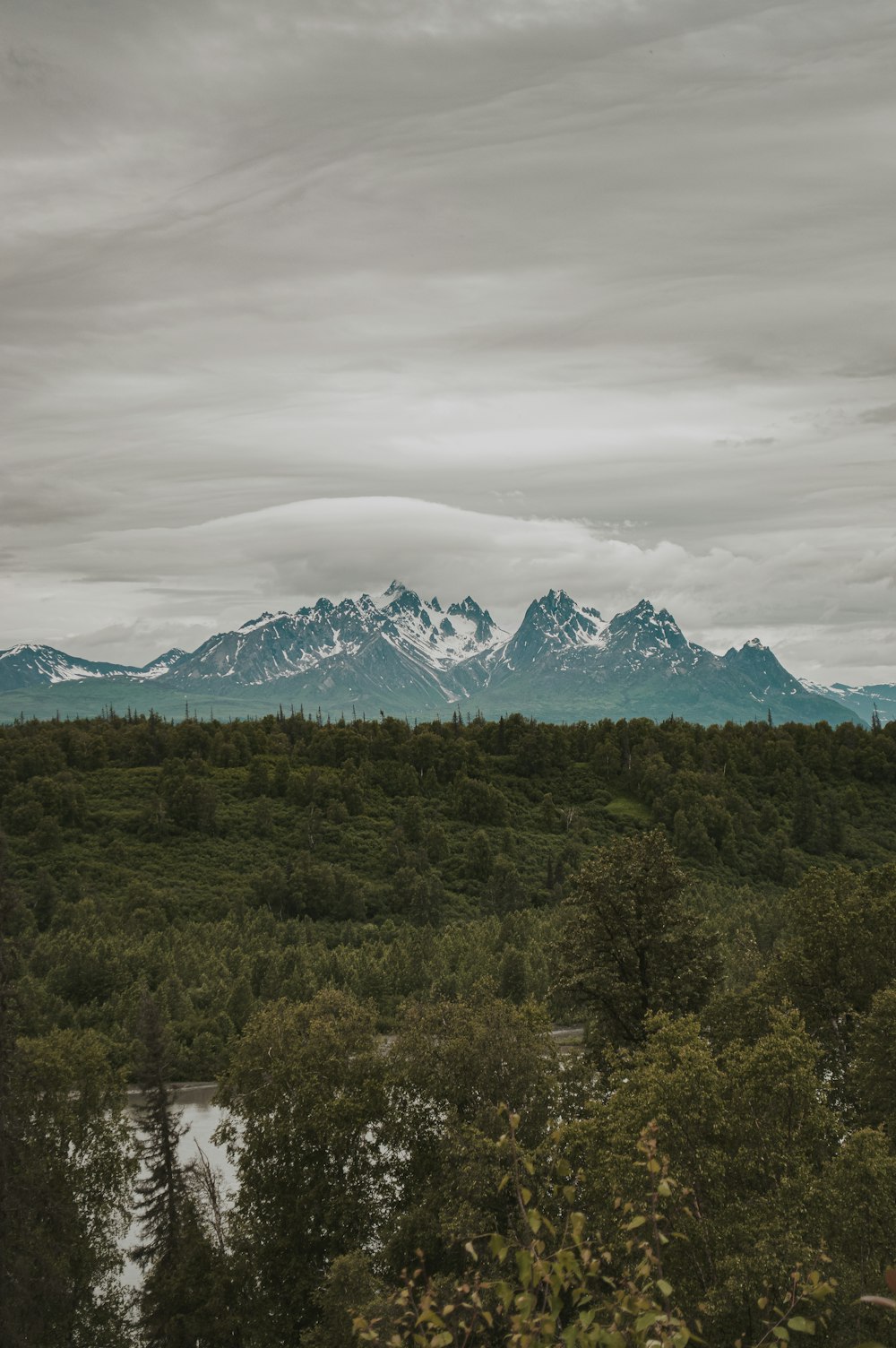 a view of a mountain range with a river running through it