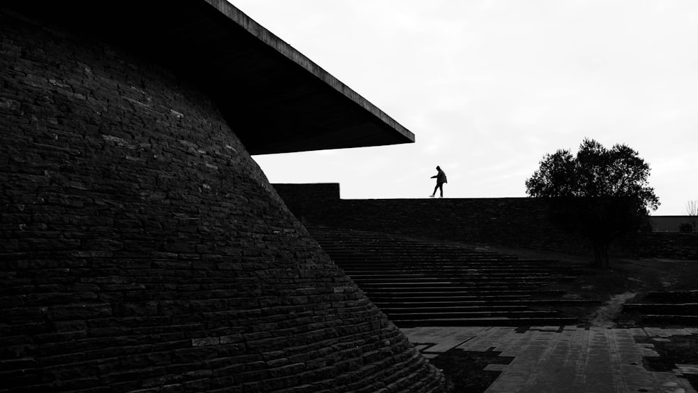 a person walking up a set of stairs