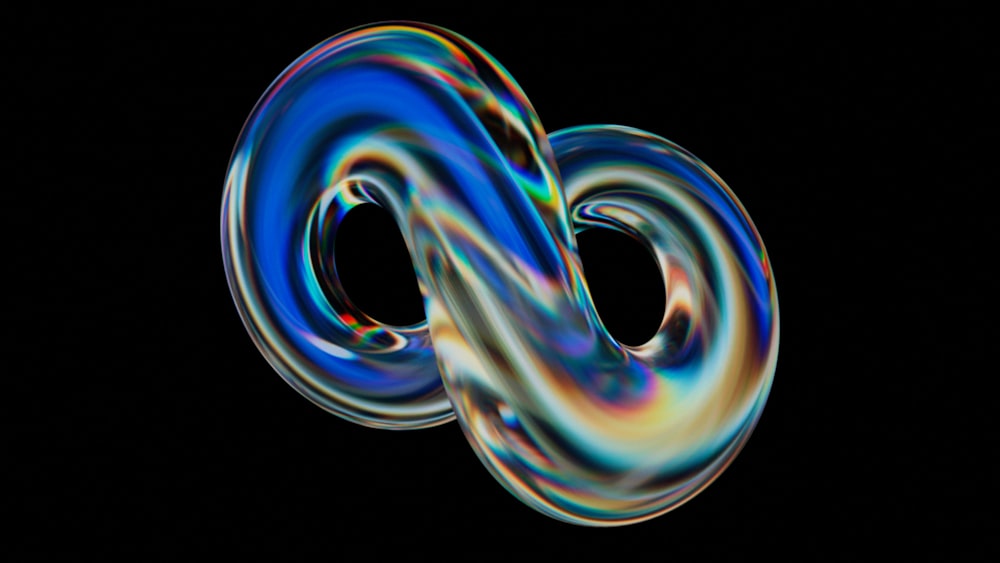 a colorful swirl in the middle of a black background