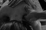 a group of people putting their hands on top of each other
