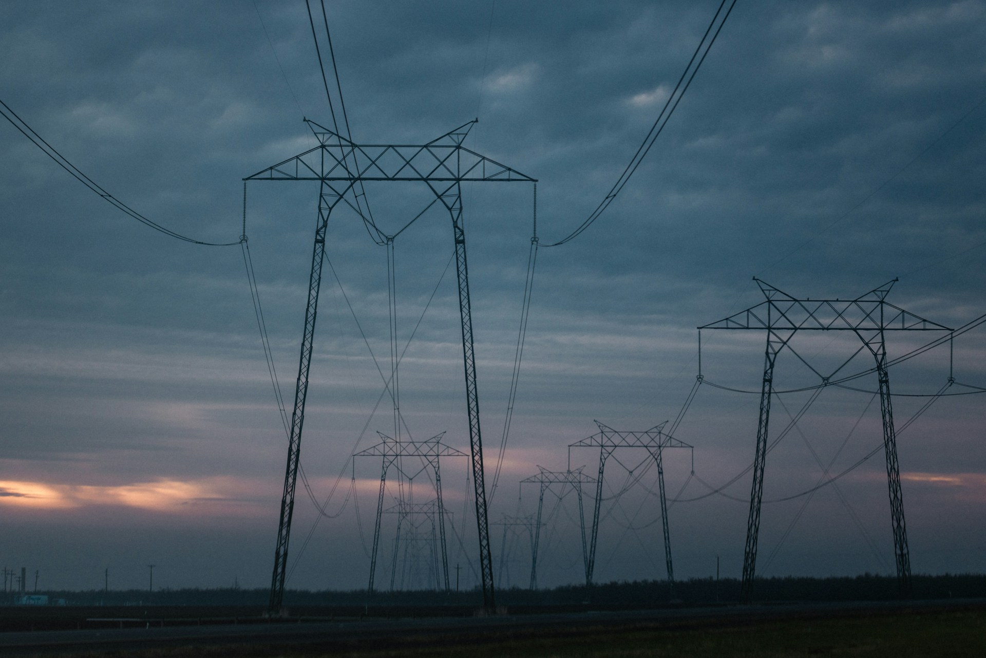 a group of power lines in the sky