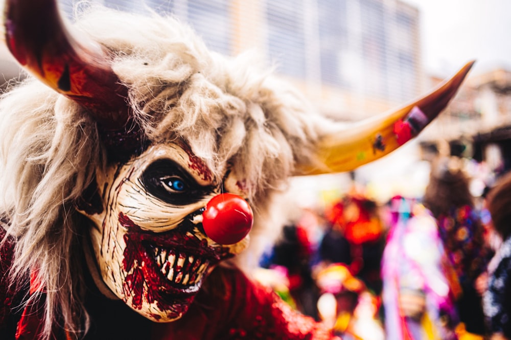 a group of people wearing costumes and masks