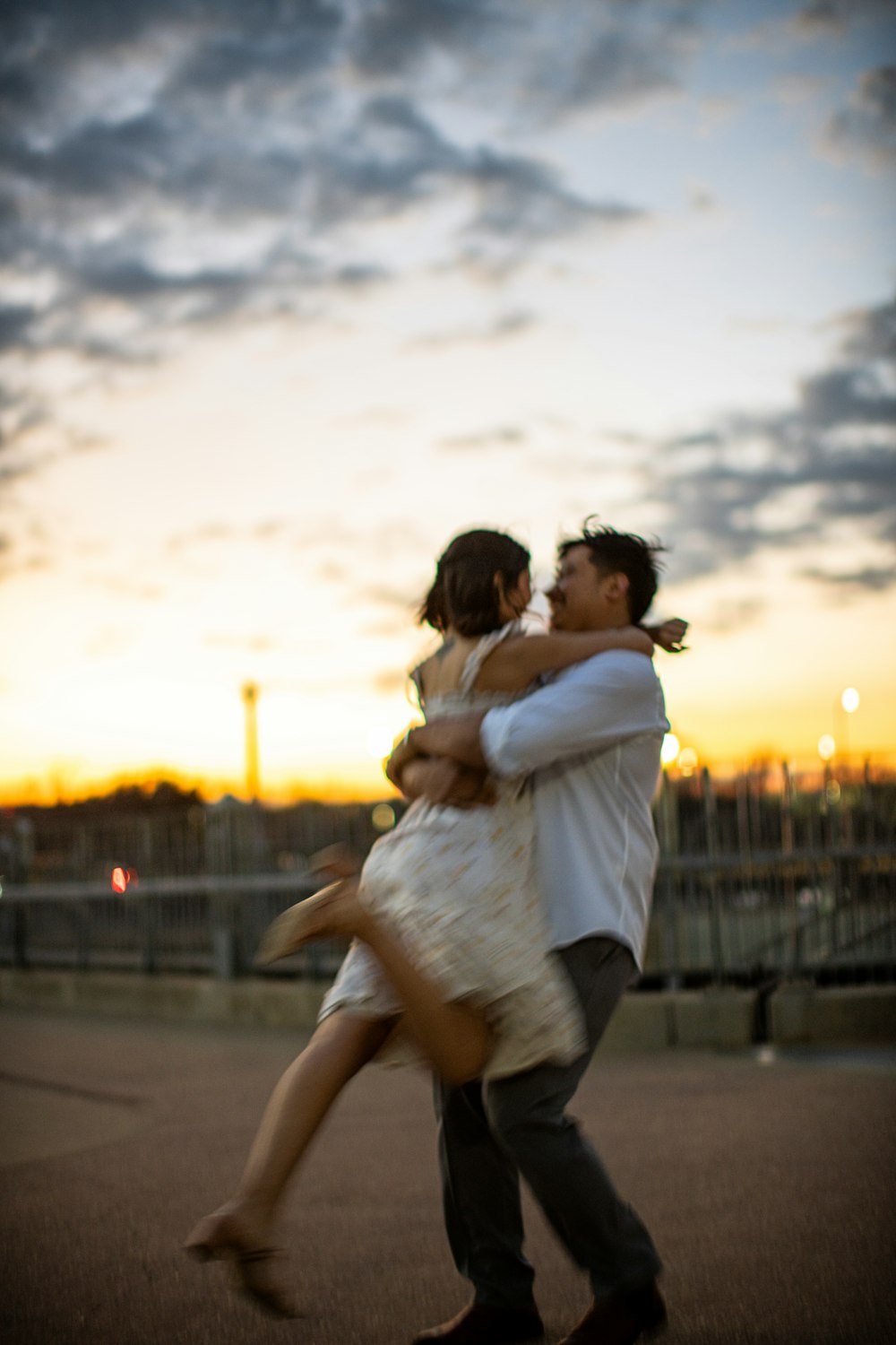 a man and a woman are dancing together