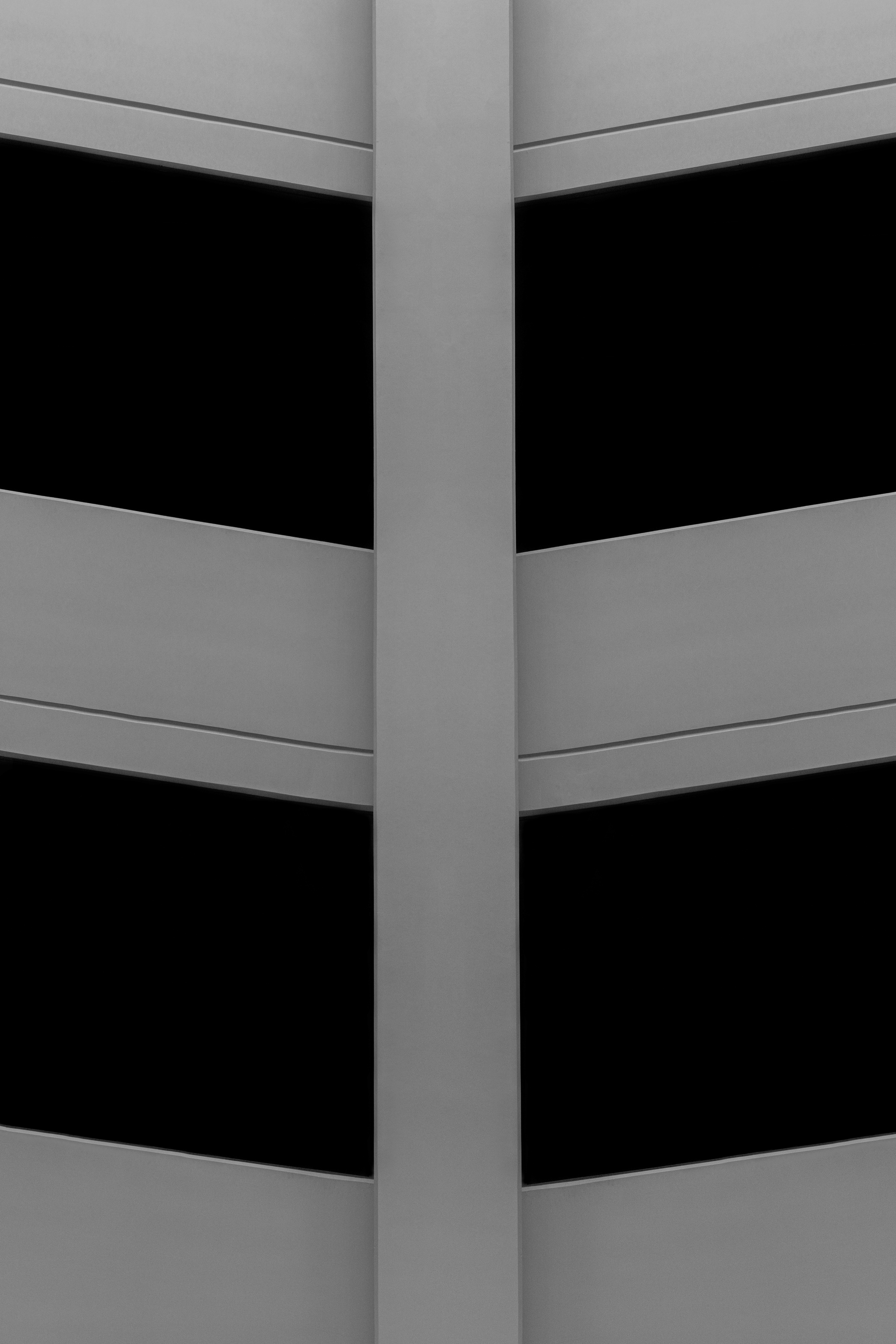 a black and white photo of a tall building