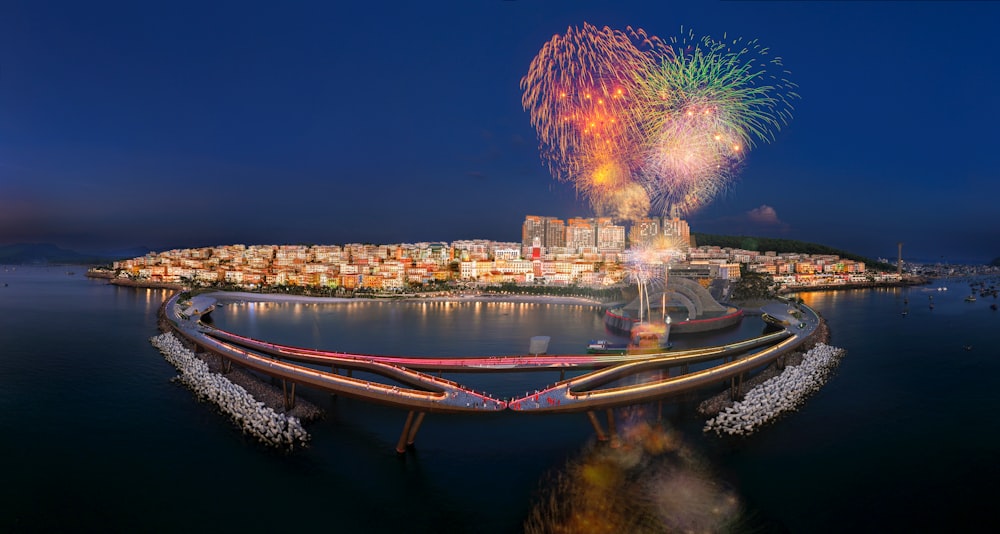 a large fireworks display over a city at night