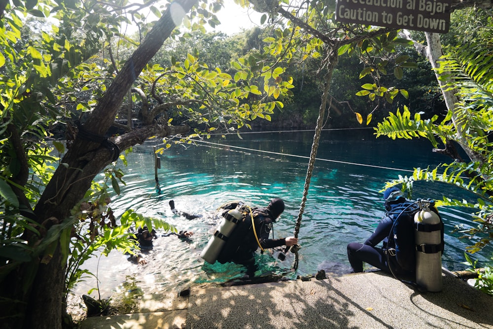 a couple of people in a body of water