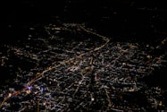 an aerial view of a city at night