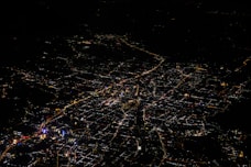 an aerial view of a city at night