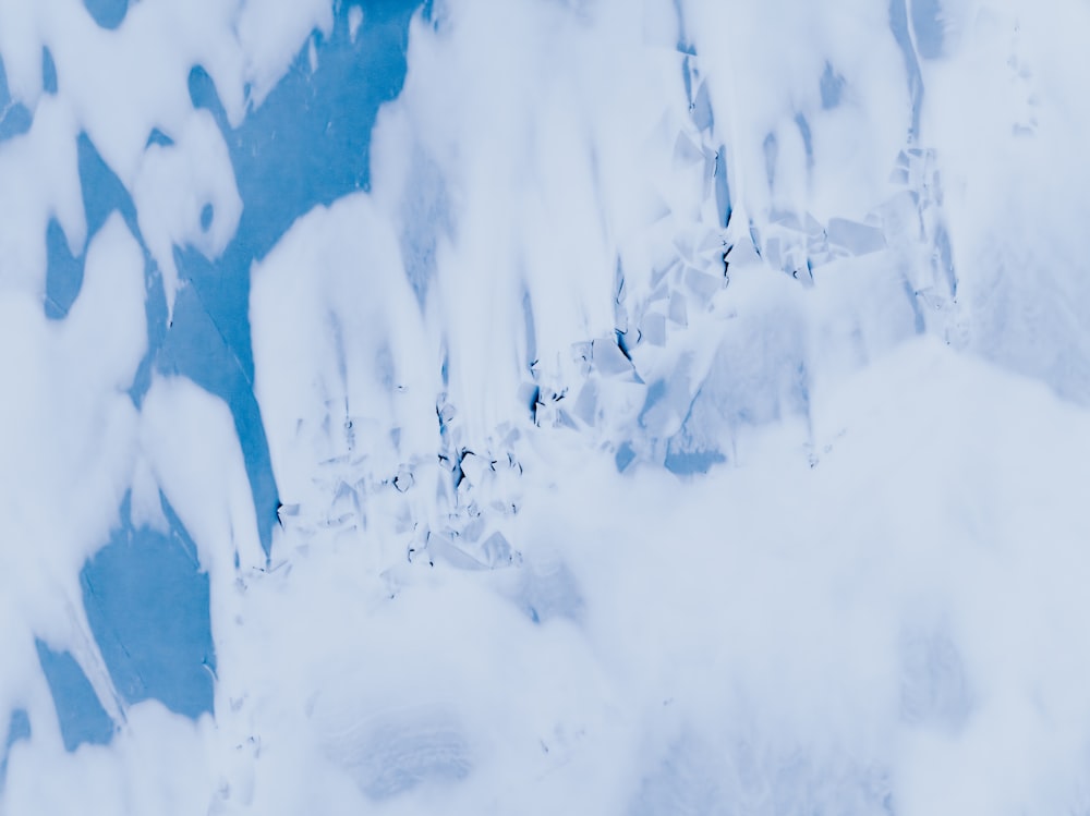 a picture of a snow covered mountain side