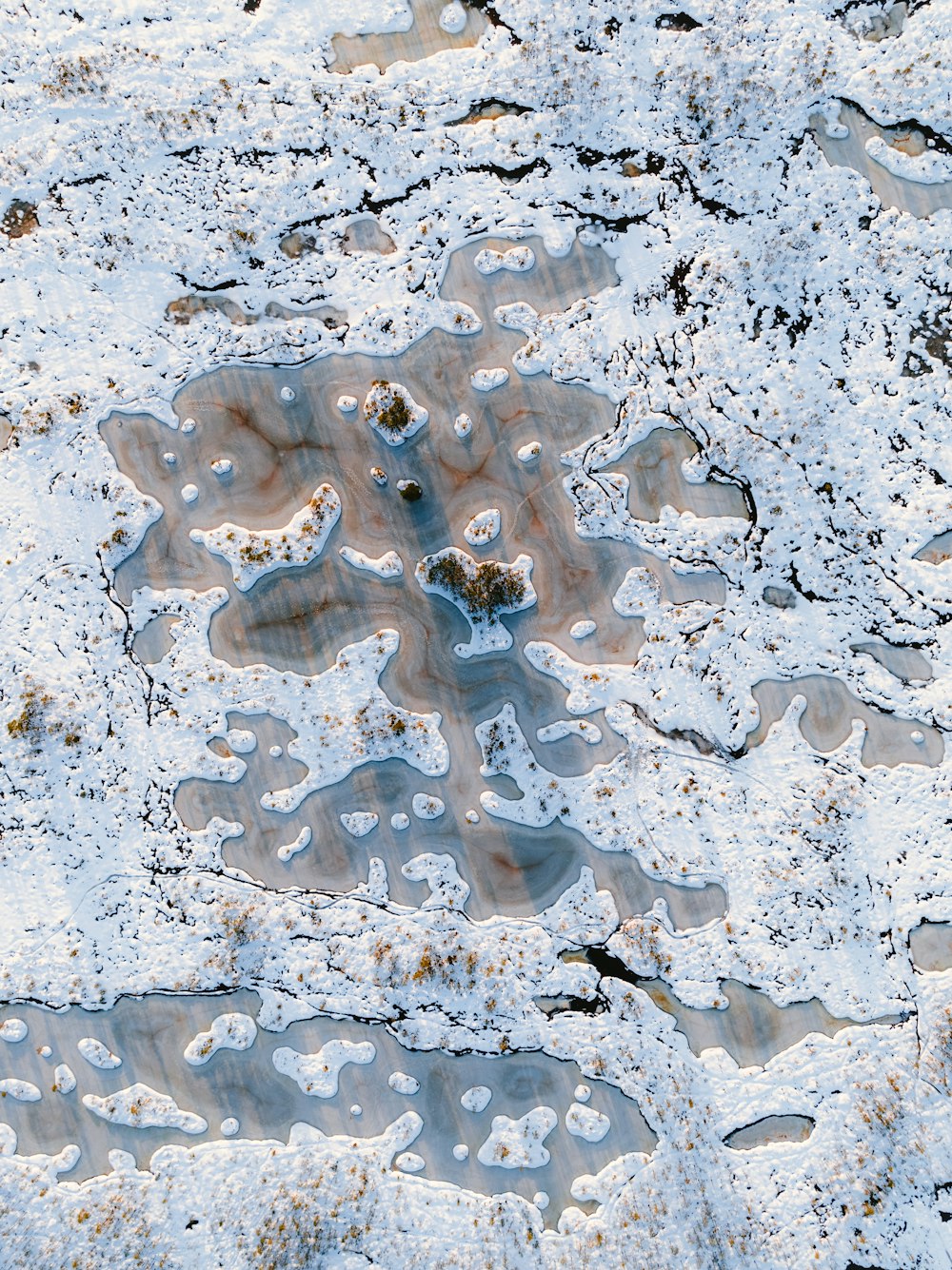 a close up of a snow covered ground